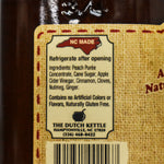 Label on a jar of dutch kettle peach butter with 'NC Made' and product ingredients and details.