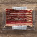 Suncrest Farms pork sidemeat, sliced and ready to add flavor to any Southern meal.
