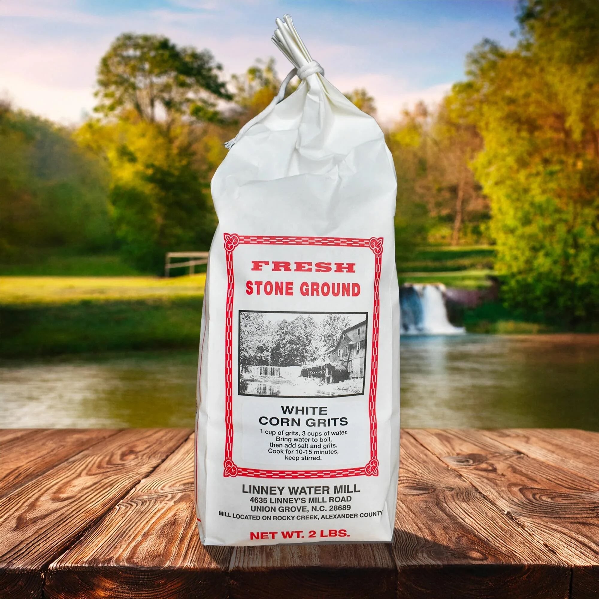 Linney Water Mill stone ground white corn grits on scenic country background.