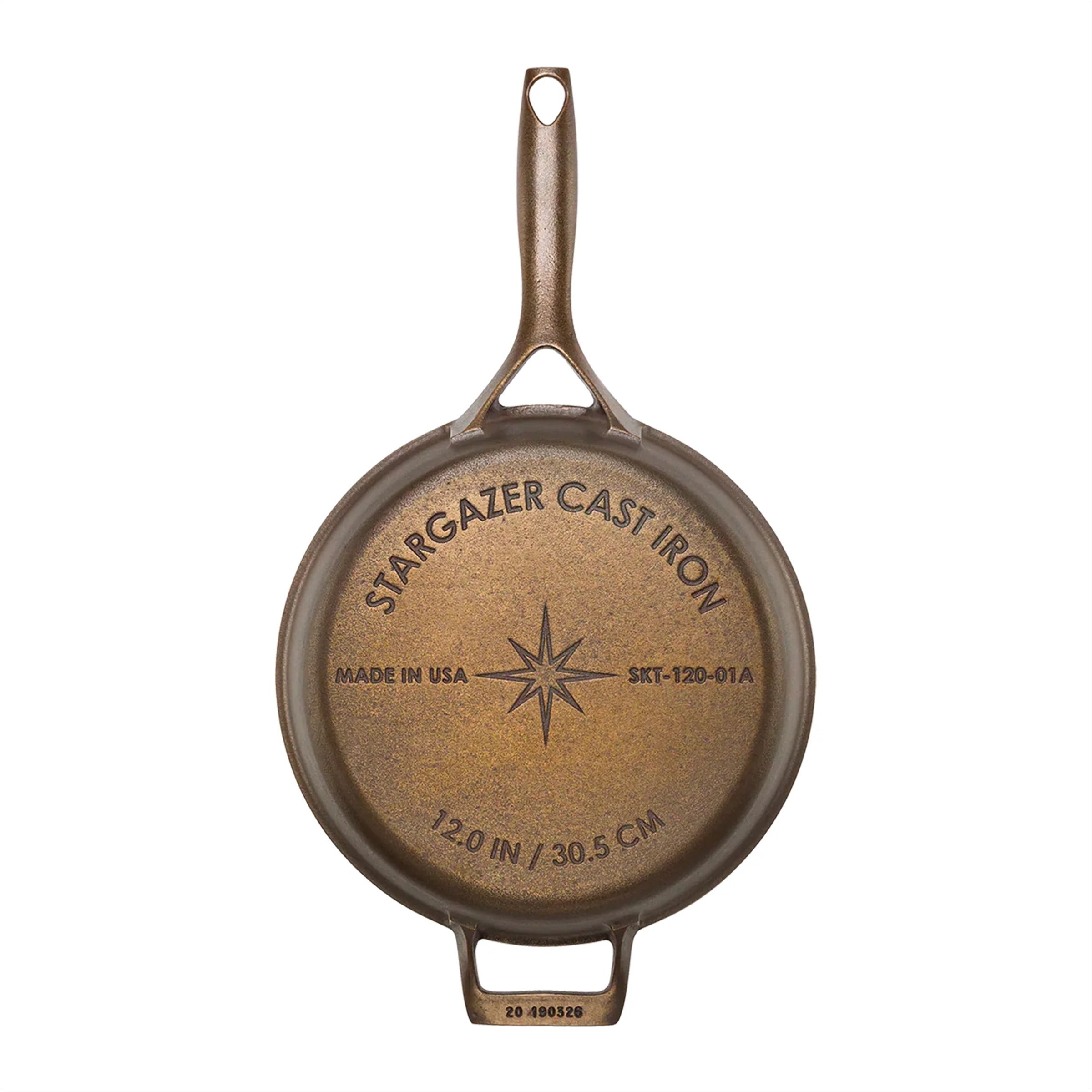 Stargazer 12 inch cast iron skillet on white background.