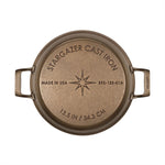 Stargazer 13.5 inch cast iron skillet on white background.