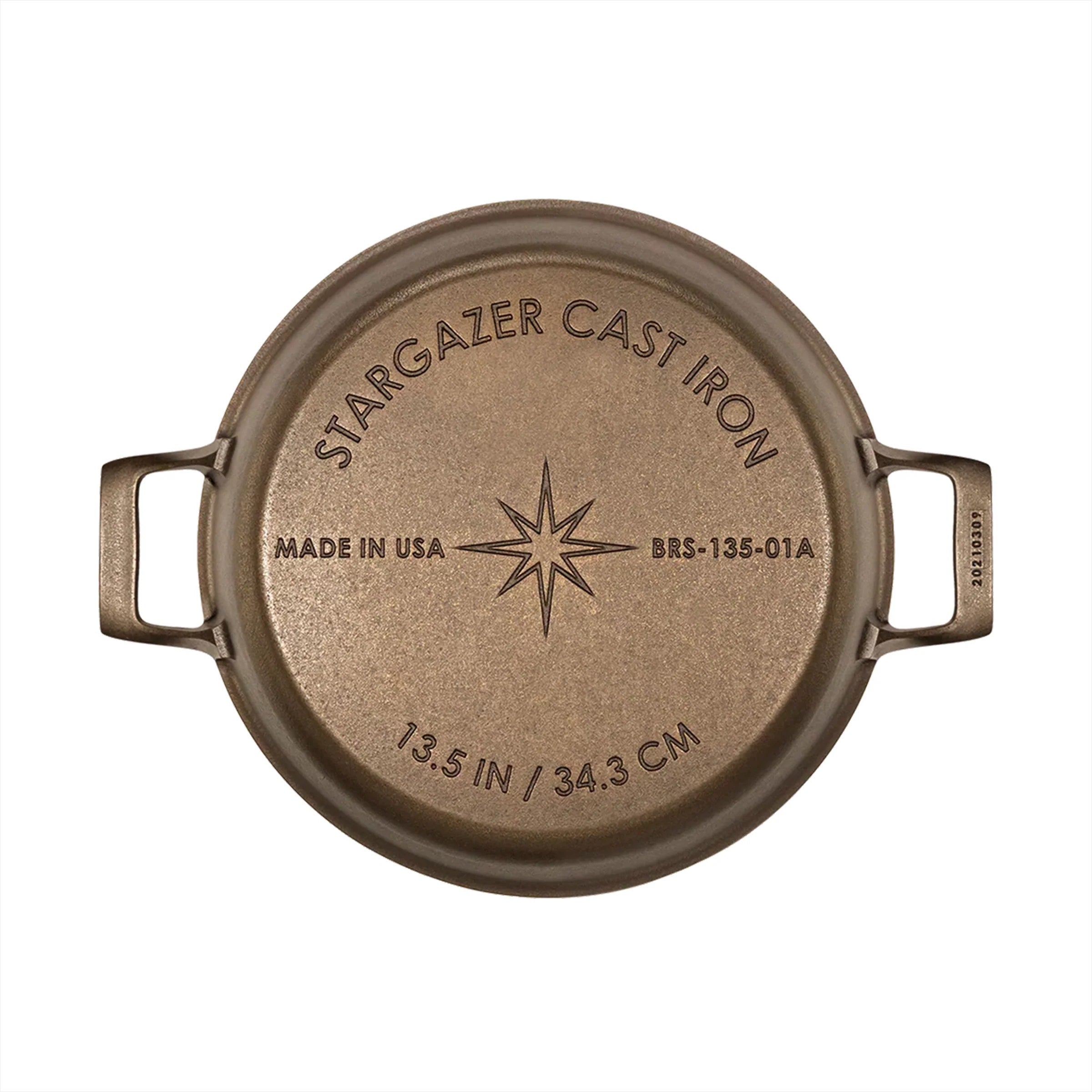 Stargazer 13.5 inch cast iron skillet on white background.